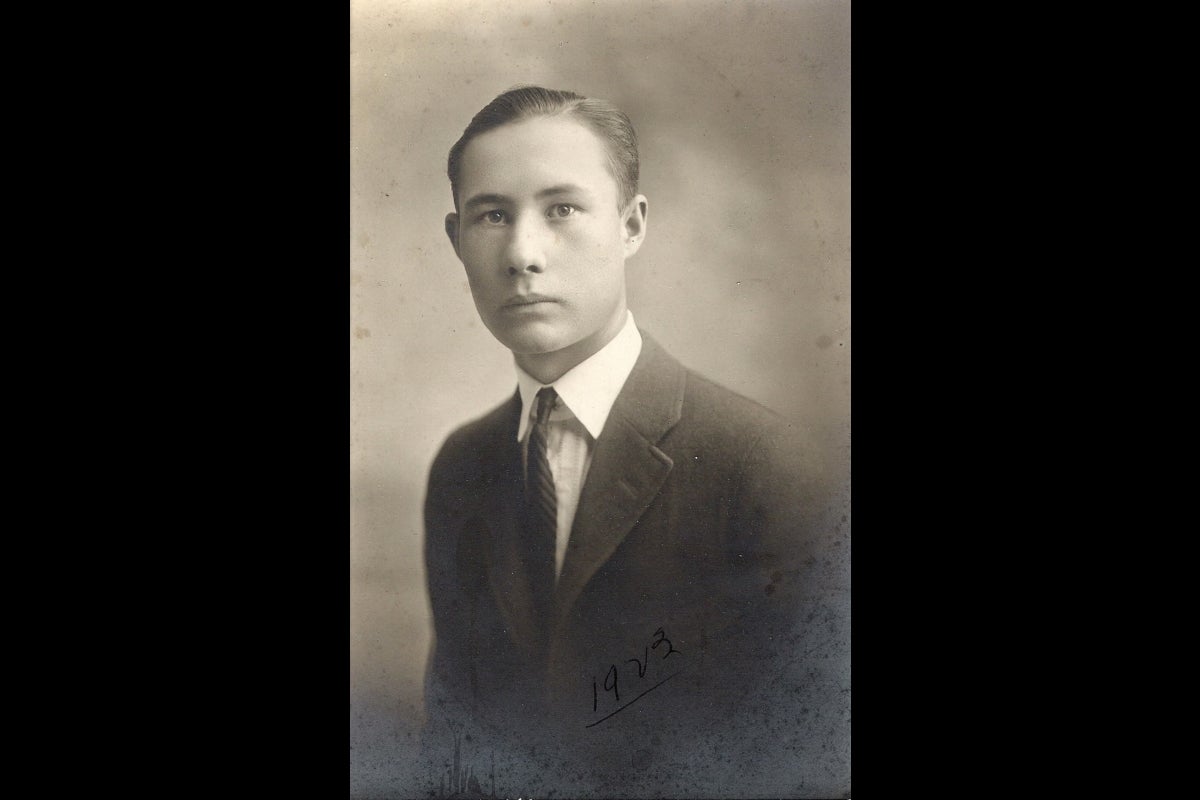 Historical black and white photo of a young man in 1923