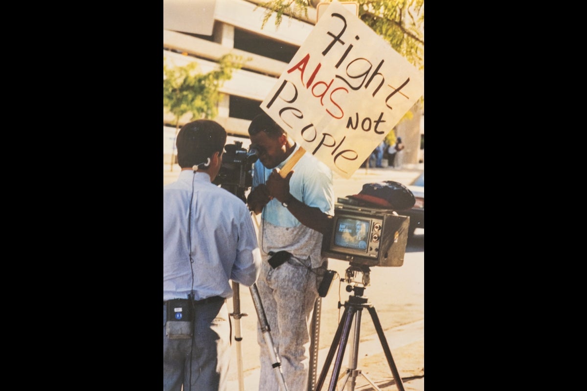 Man holding sign