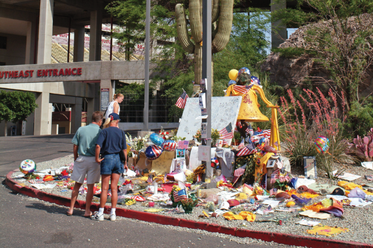 Items left for a memorial in front of stadium