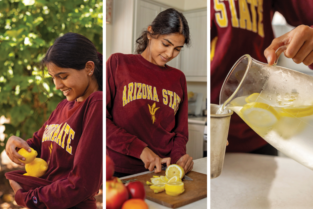 A young woman in an ASU sweatshirt makes lemon water