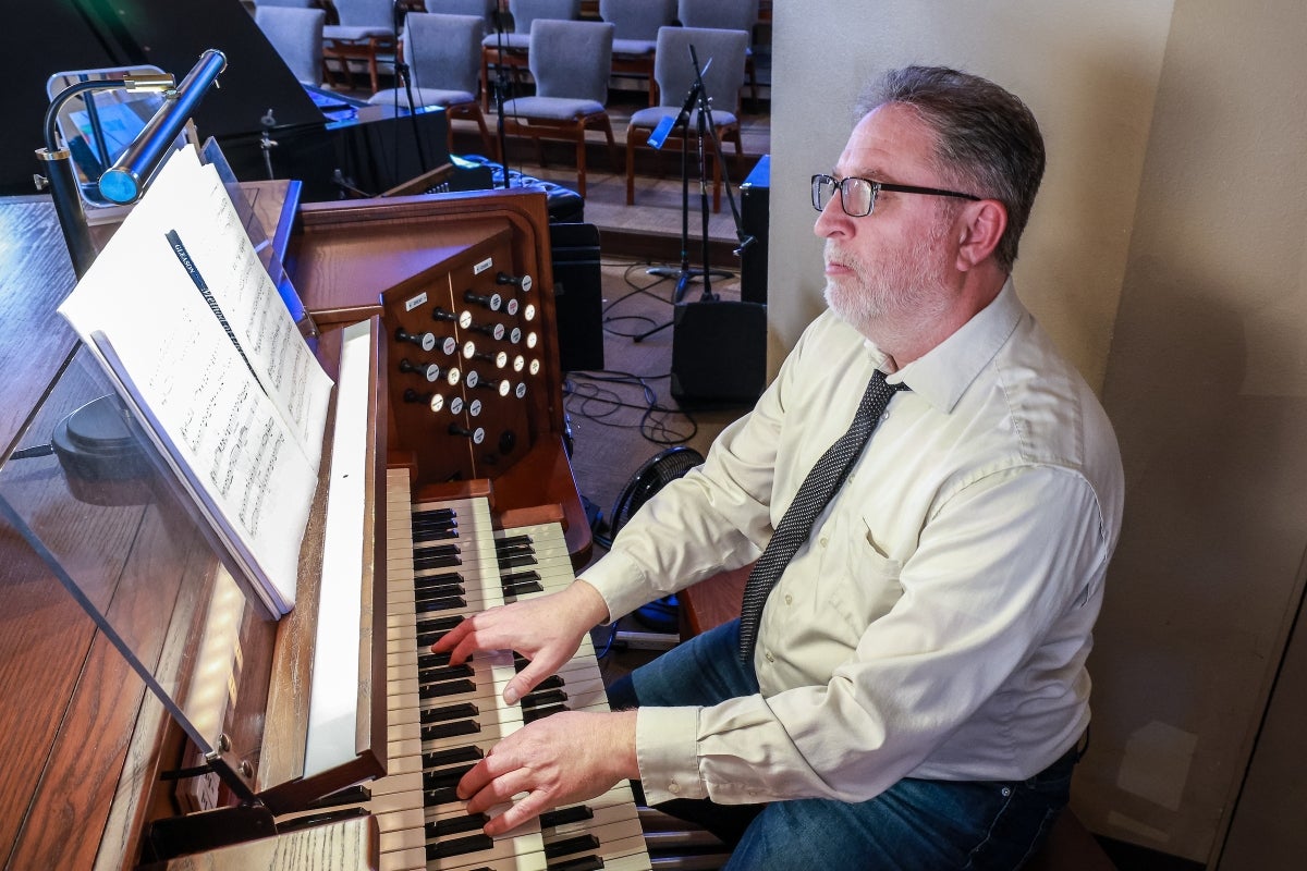 Man playing a piano.