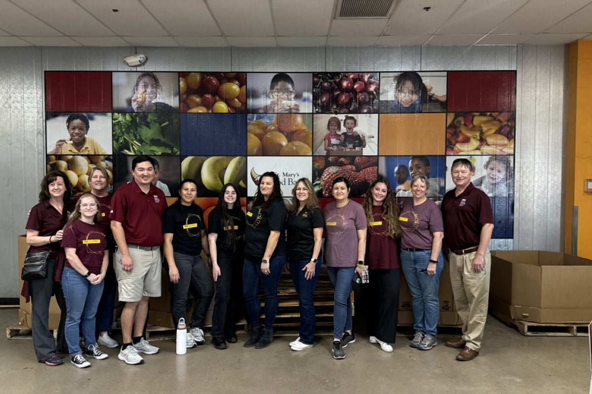 Staff and faculty from the School of Geographical Sciences and Urban Planning volunteer at St. Mary's Food Bank.