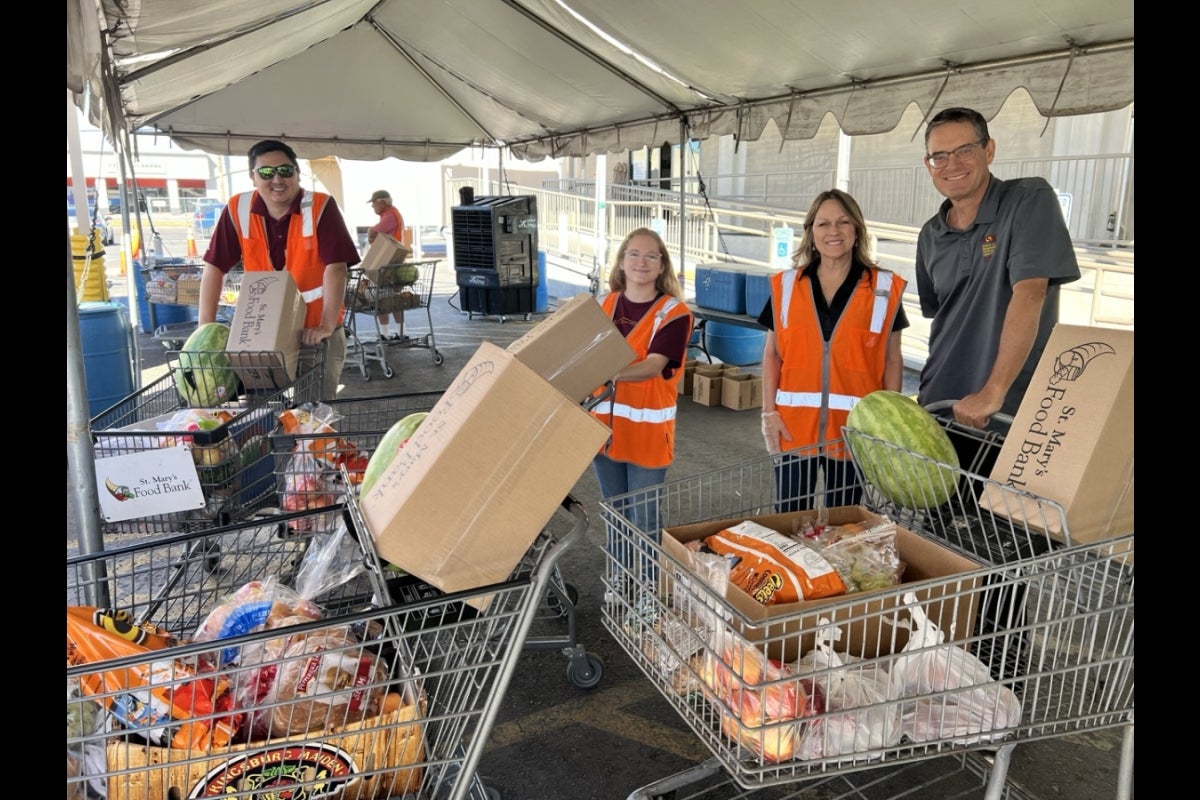 Staff and faculty from the School of Geographical Sciences and Urban Planning volunteer at St. Mary's Food Bank.