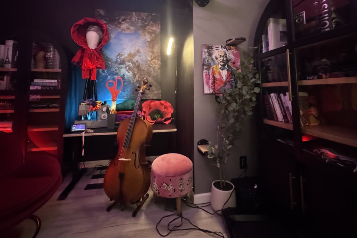 Room filled with art, musical instruments and books.