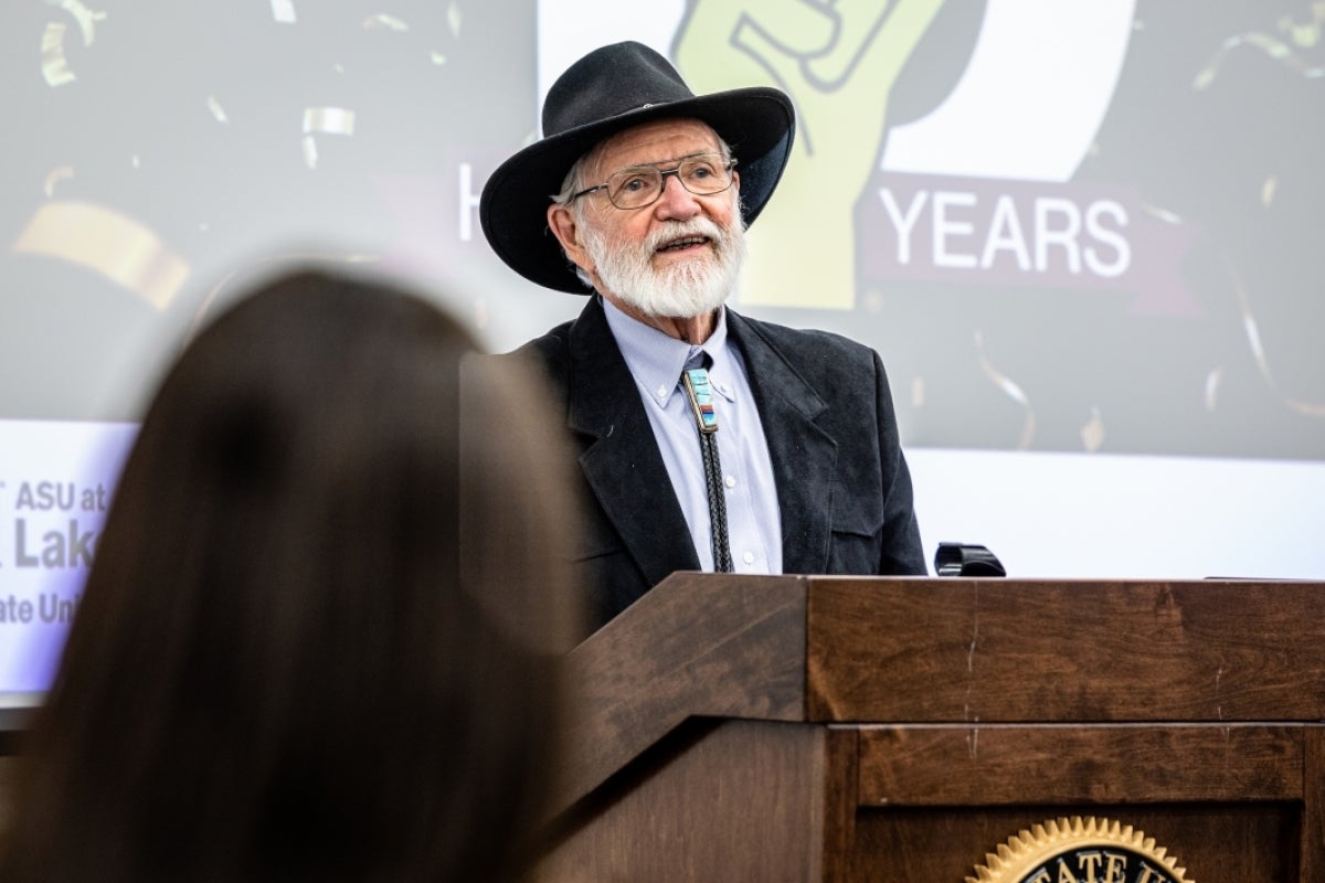 Man speaking at podium