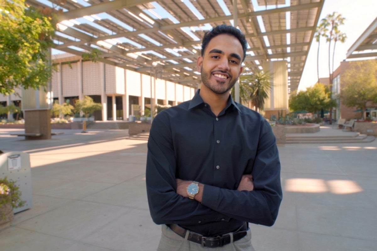 Nikhil Dave, researcher in the ASU-Banner Neurodegenerative Disease Research Center at the Biodesign Institute, smiles for a portrait on the ASU Tempe campus