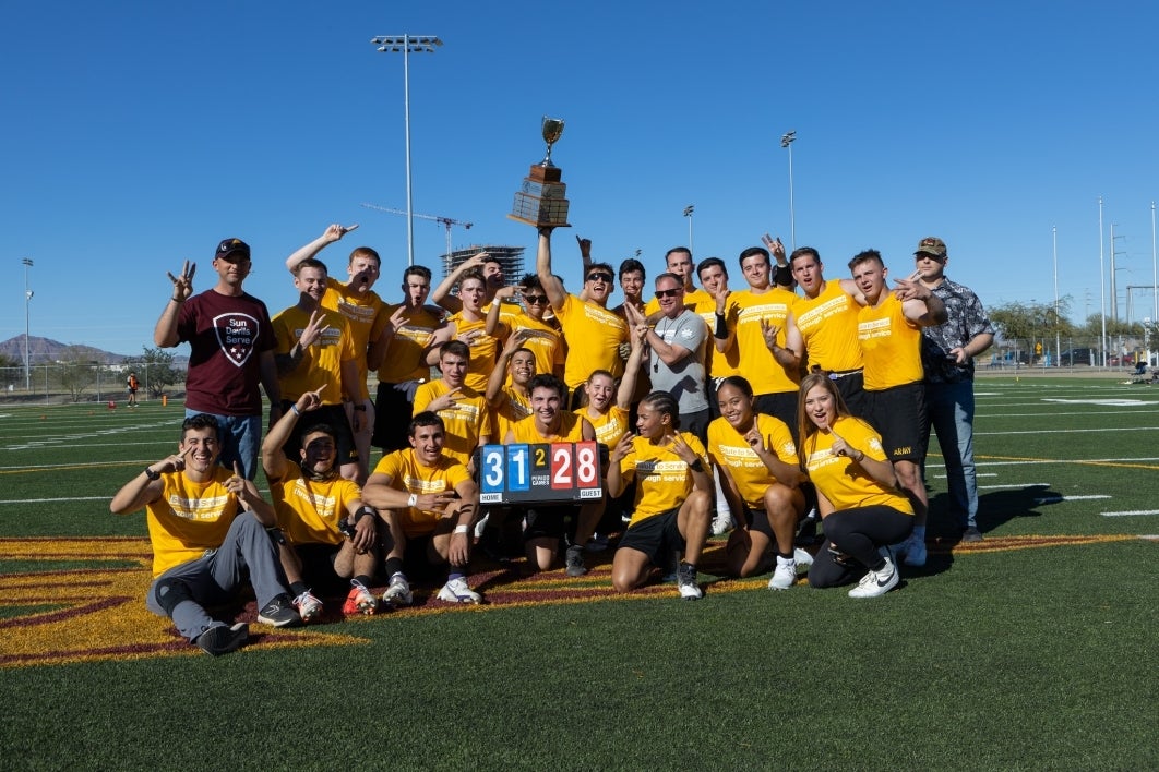 Team photo outside during the flag football tournament.