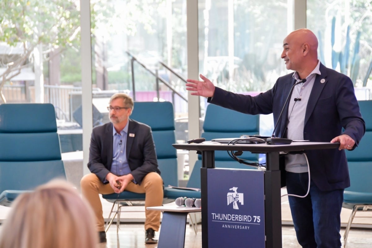 Dean Khagram addresses attendees during a special presentation from David Knower, chairman of the advisory board of the European League of Football and a 1985 graduate of Thunderbird. 