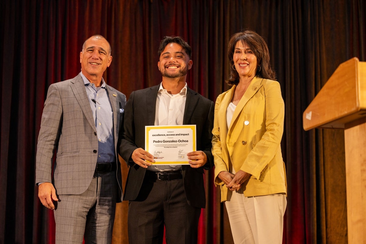 Student being recognized on stage