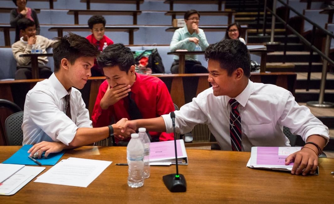 APACE Academy students Marc Flom, left, Dwayne Lanwe, and Randy Oshiro