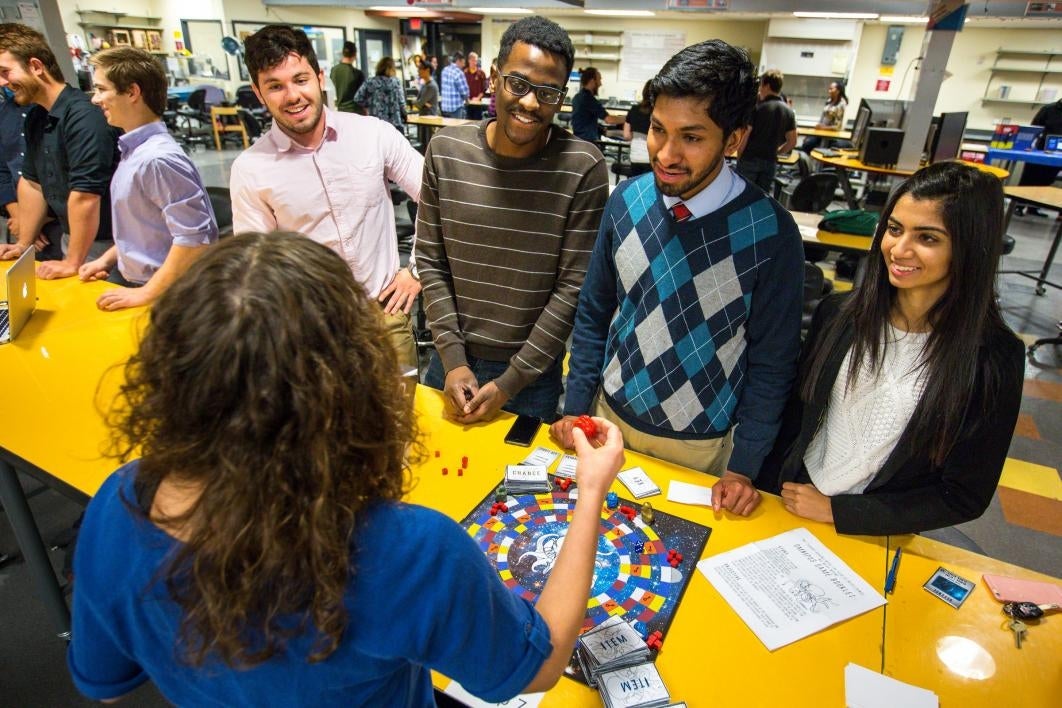 Students speak about the board game they created.