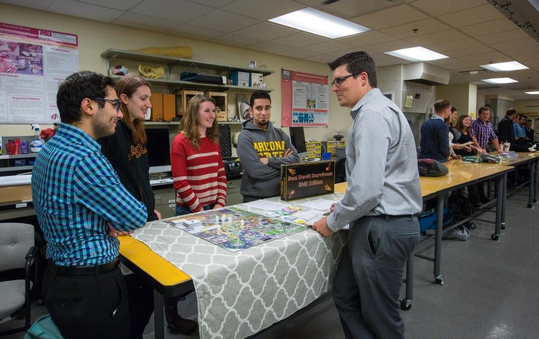 Students speak about the board game they created.