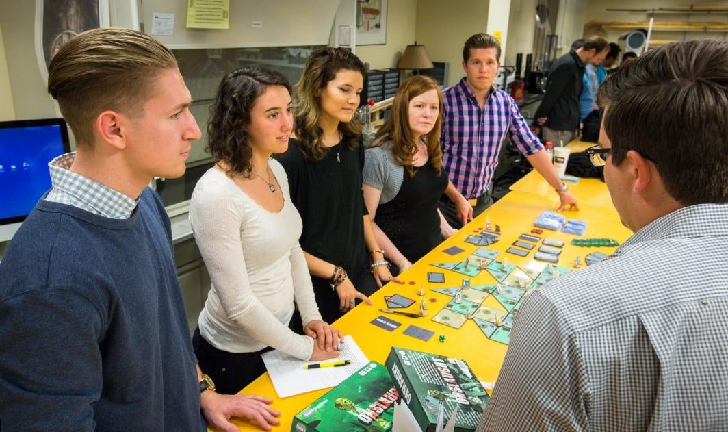 Students speak about the board game they created.