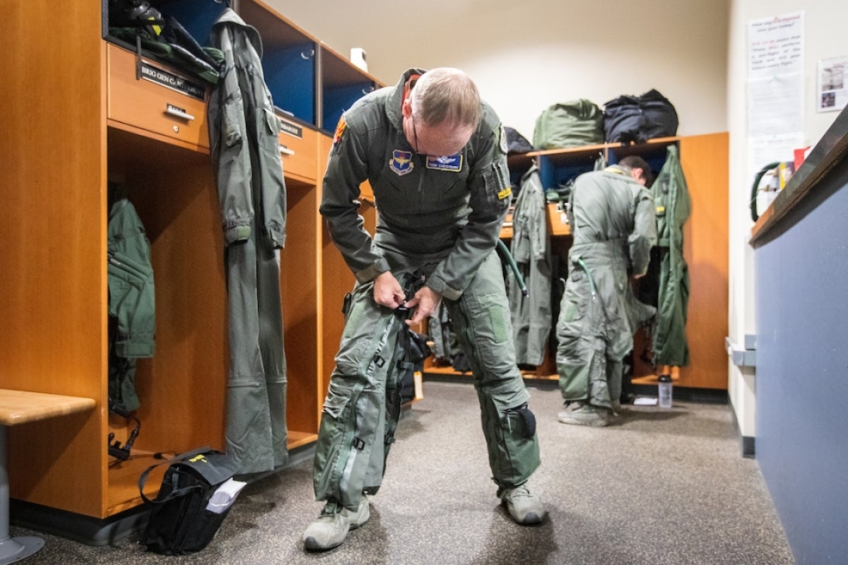 Pilot getting dressed