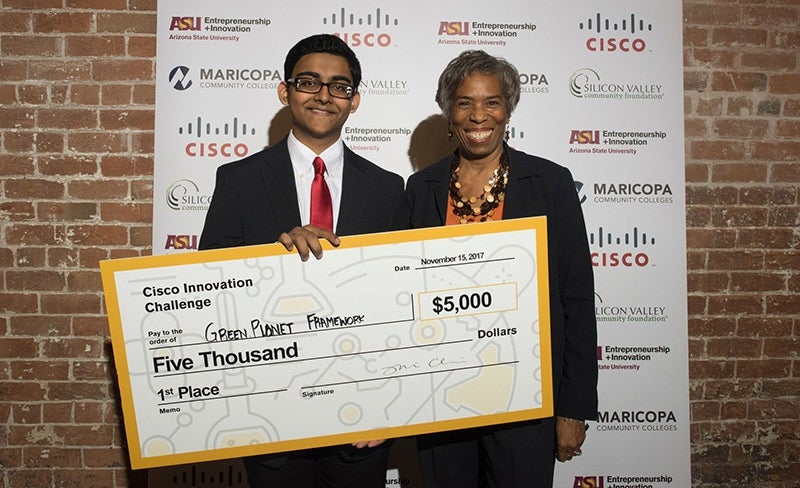 Cisco Innovation Challenge winner Joshua Pardhe (left) with fellow entrepreneur and Challenge judge, Loretta Love Huff. Photo by Laura Segall.