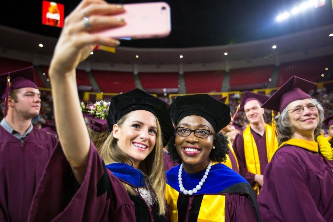 graduates taking a selfie