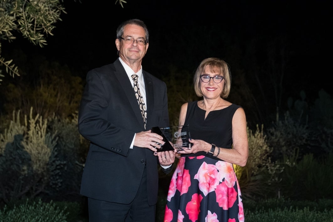 Dr. Kevin Foster of Arizona Burn Center with College of Health Solutions Dean Deborah Helitzer at the Celebration of Health event.