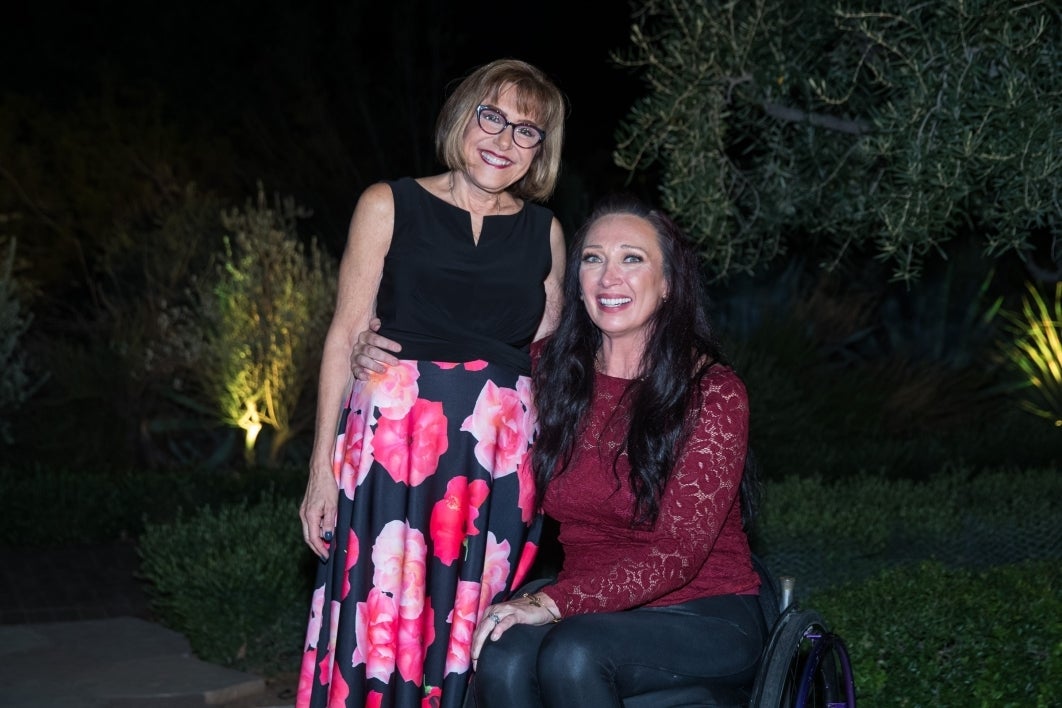 College of Health Solutions Dean Deborah Helitzer poses with Olympic gold medalist Amy Van Dyken-Rouen.