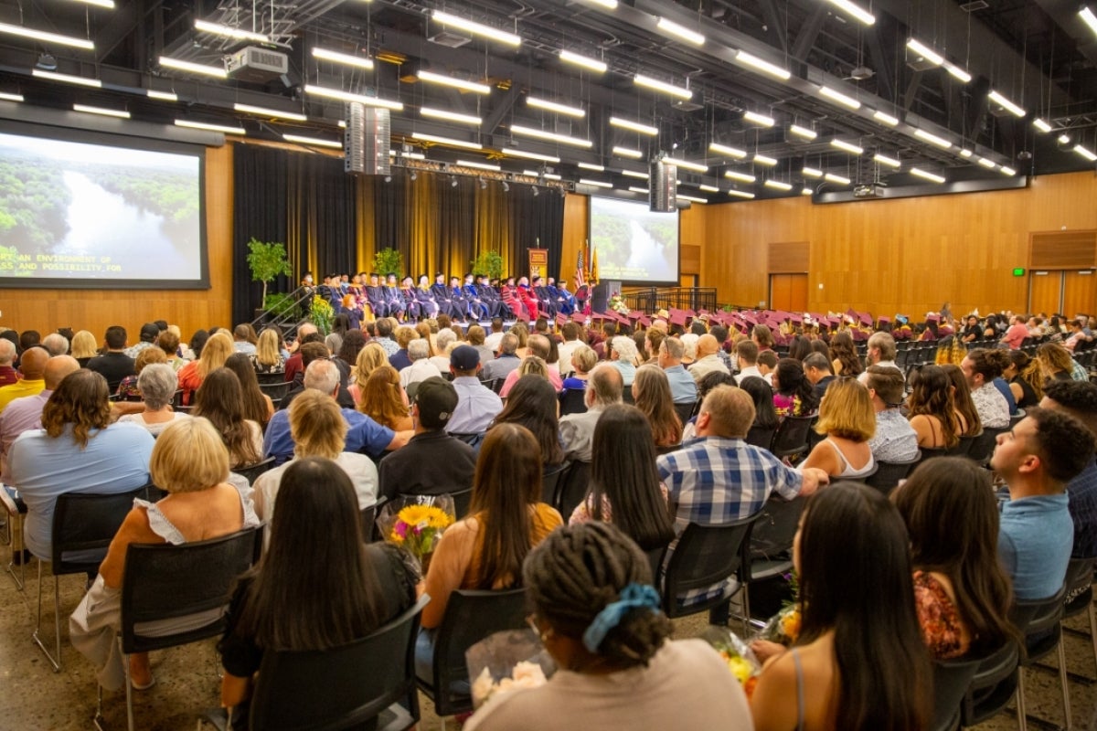 Family and friends of graduates look on during Edson College's convocation ceremony.