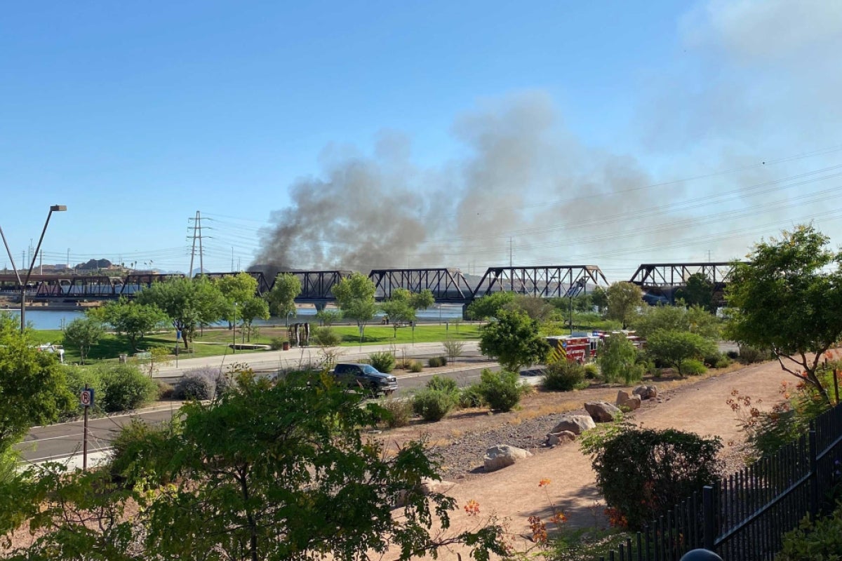 A train derailed on a bridge across Tempe Town Lake