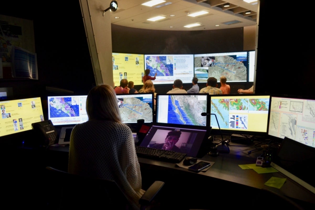 Researcher Greer Dolby leads a Baja Geogenomics meeting in ASUs Decision Theater