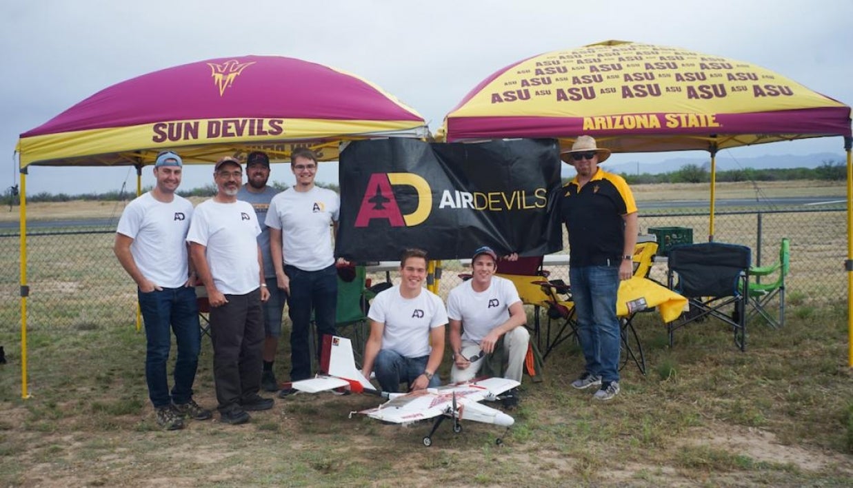 The core AIAA DBF competition team members, from left to right: Luke Burgett, Timothy Takahashi, Philip Wyman, Daniel Kosednar, Nikolay Kolesov, Evan Draganchuk and Don Wood.