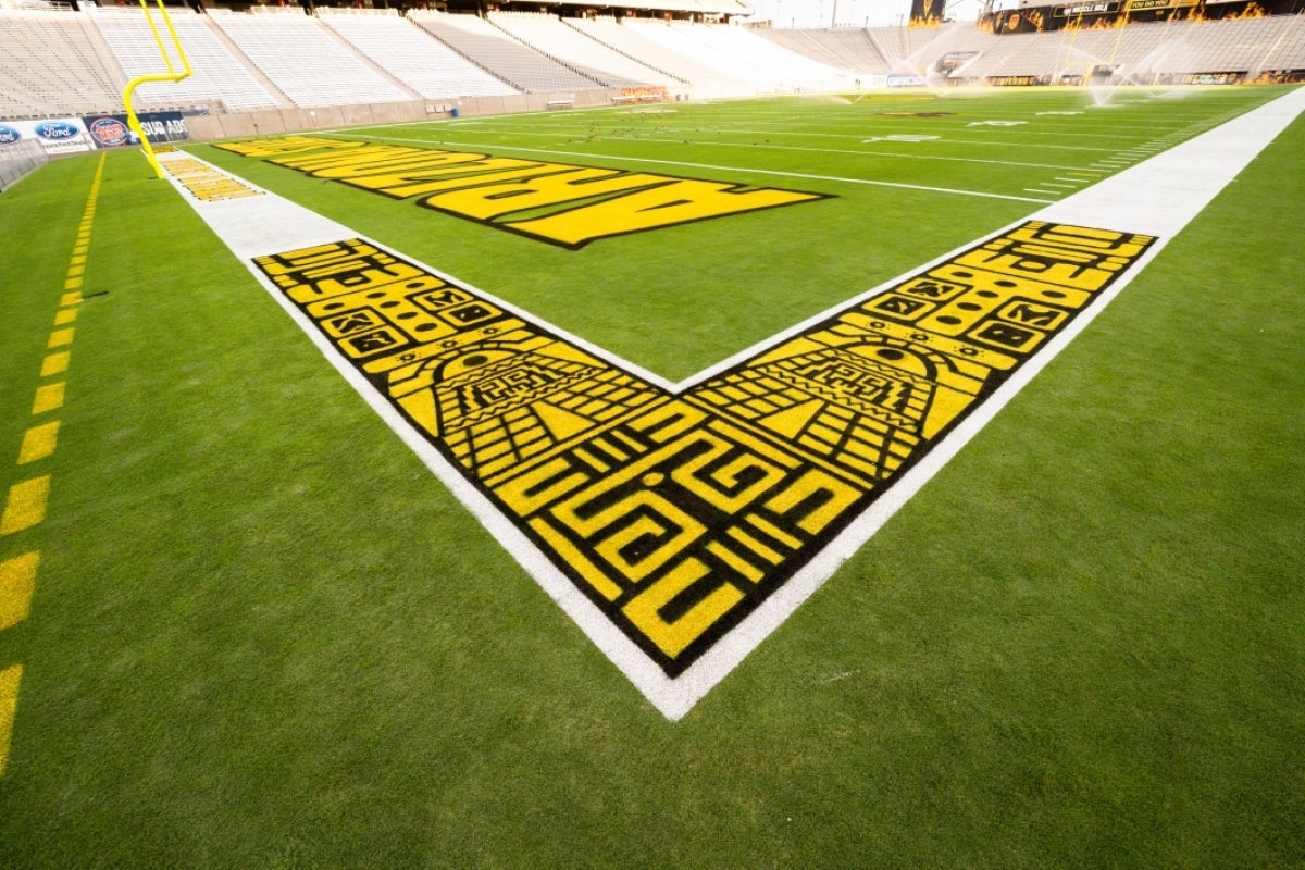 Mayan design painted on corner of football field.