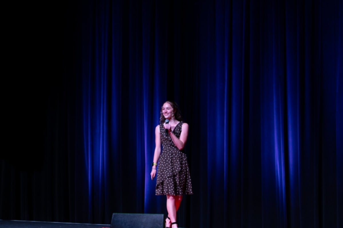 Student speaking onstage.