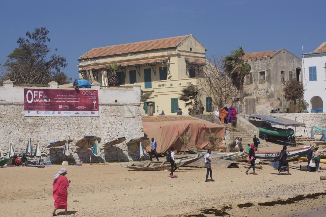 Sign advertises Dak'Art Off exhibitions on Gorée Island