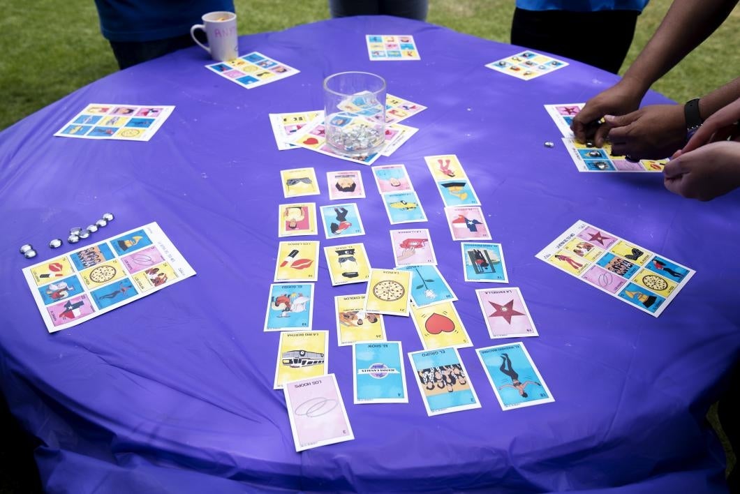 Students and faculty play a game of Selena-themed lotéria at the April 16 event honoring the singer.