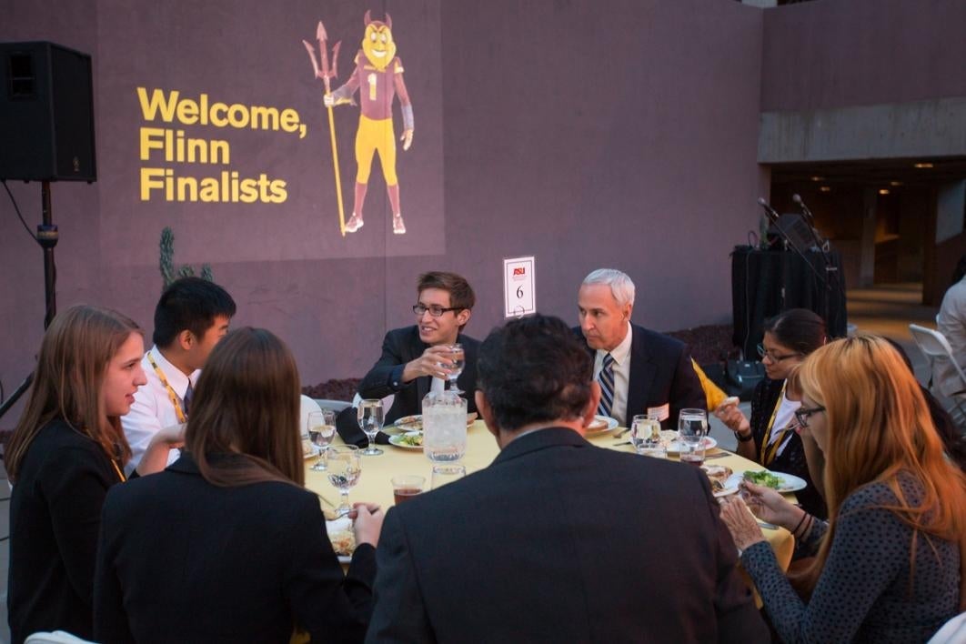 People eating at a round table.