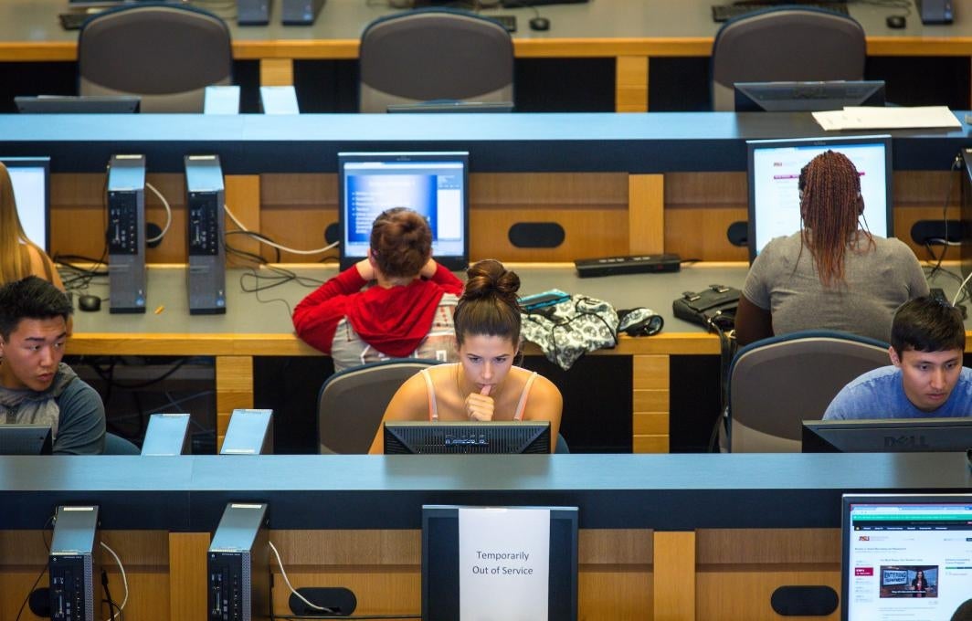 student looking at computer screen