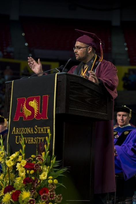 student speaking at commencement