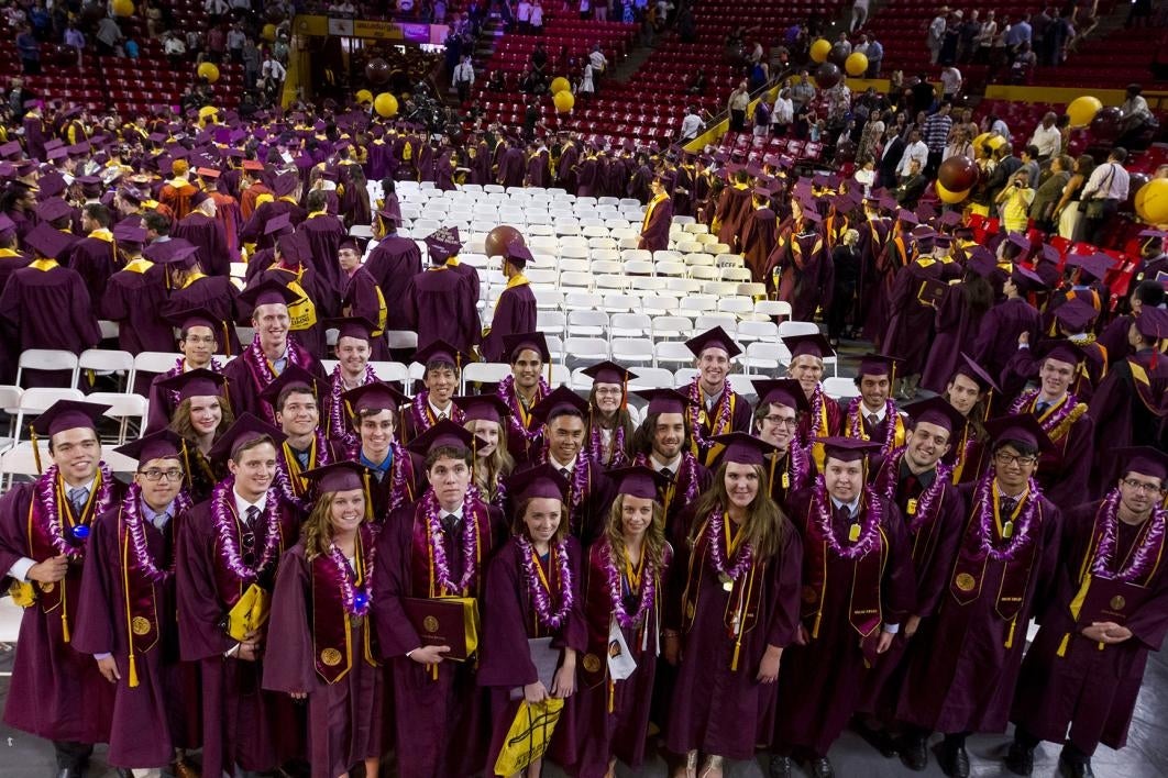 group of graduates posing at convocation