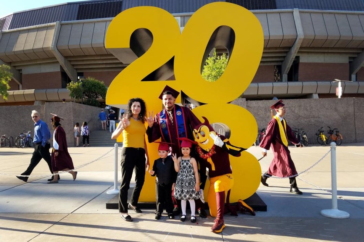 Marine Corps veteran and mechanical engineering graduate Jovani Hernandez and family