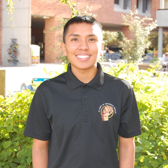 portrait of ASU College of Health Solutions graduate Kameron Granger smiling