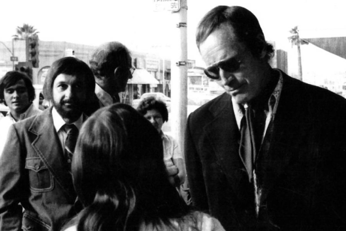 Charlton Heston and Salerno talk to students