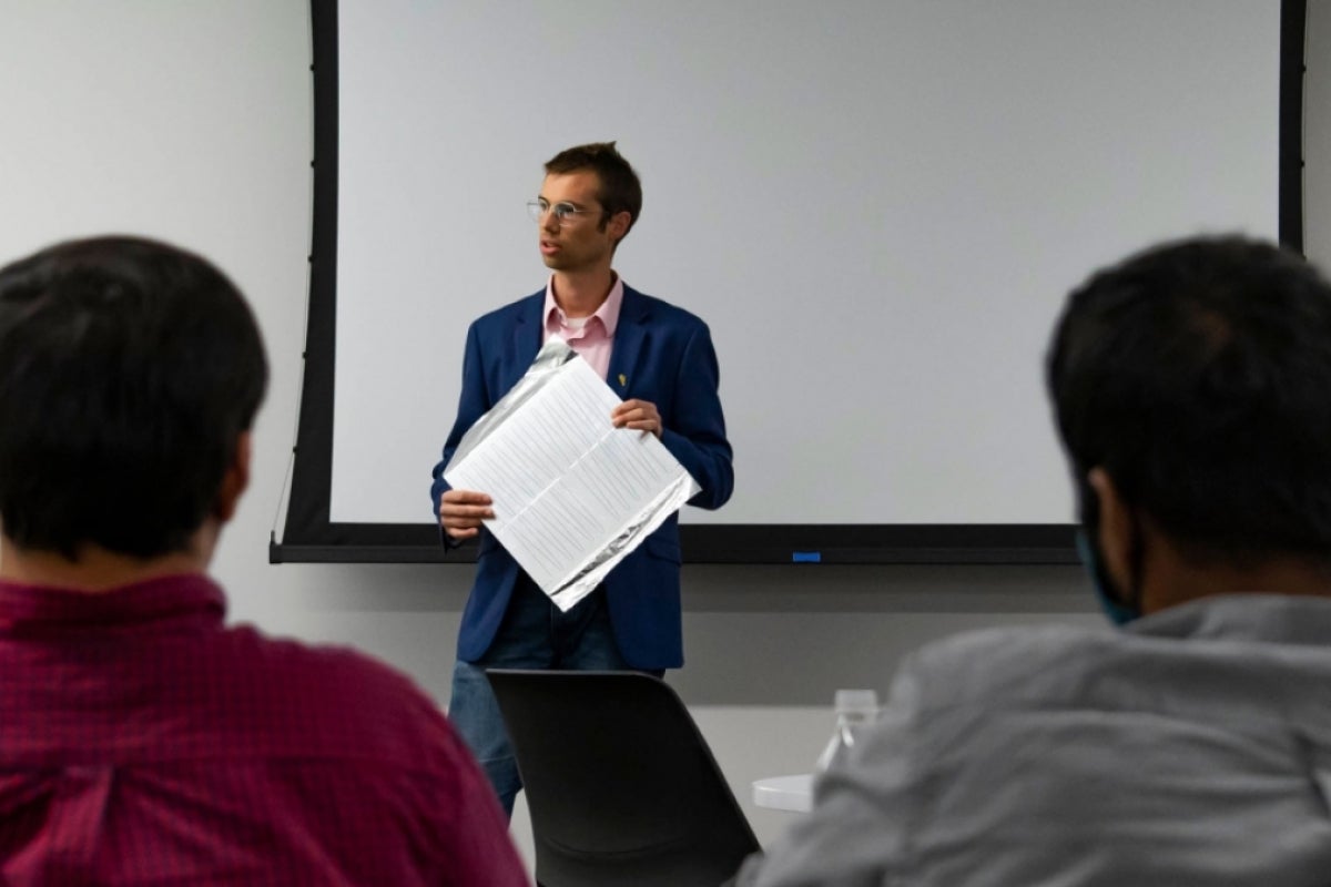 Zachary Holman demonstrates Sunfoil technology of his startup, Sunflex Solar.