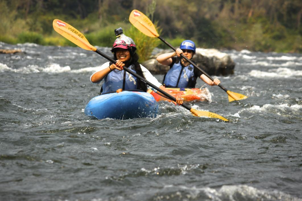 Kayakers on the Rogue River in Oregon