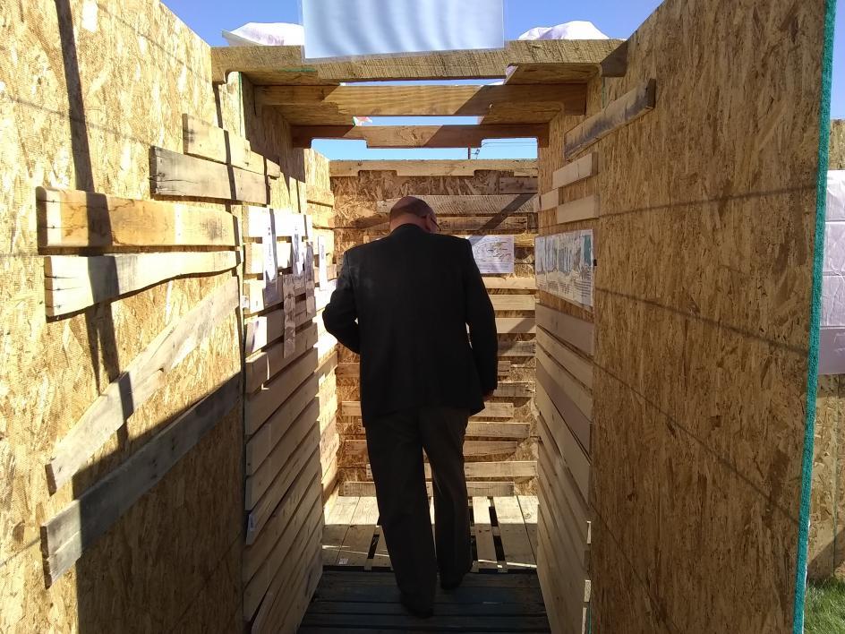 ASU Foundation Professor of History Brooks Simpson in WWI Trench exhibit at ASU Polytechnic campus