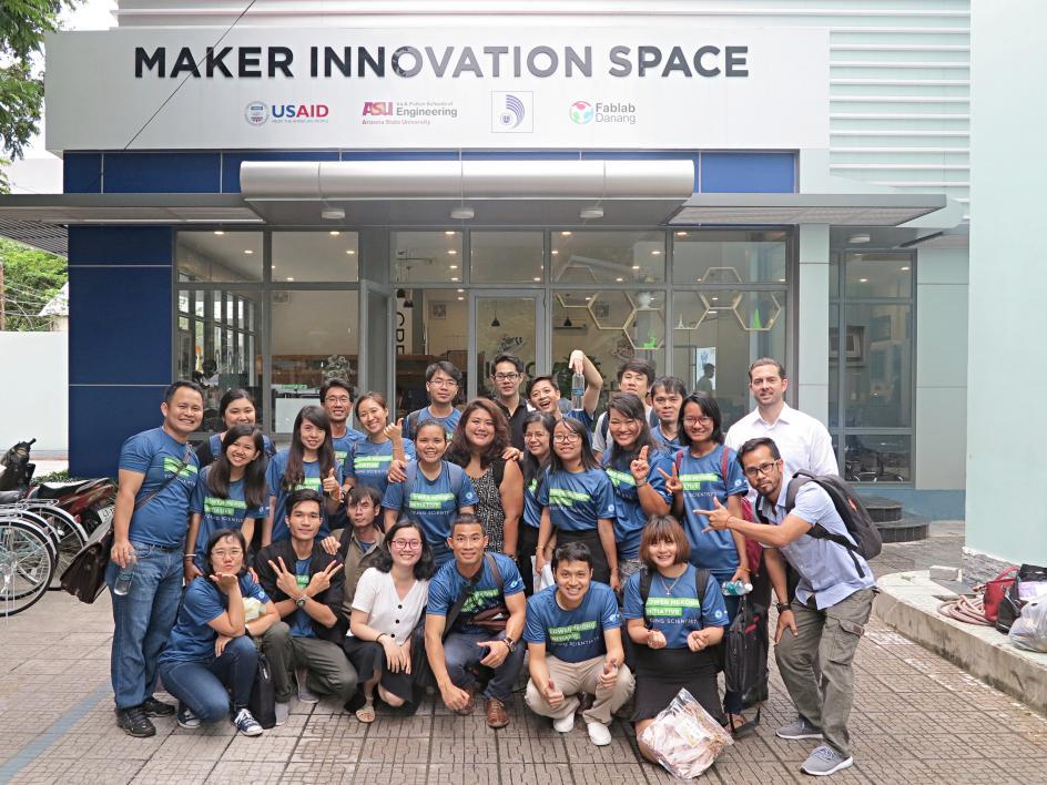 large group of students posing outdoors