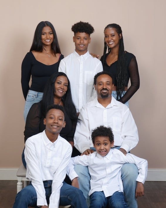 Portrait of ASU grad Sabrina Mehari and her family.