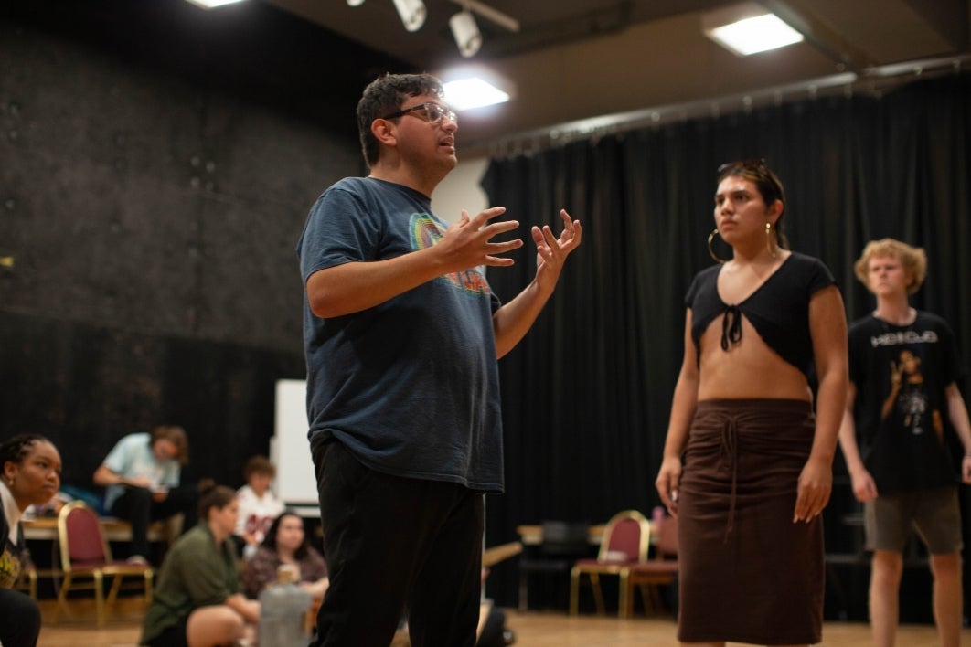 Actors on stage during a play.