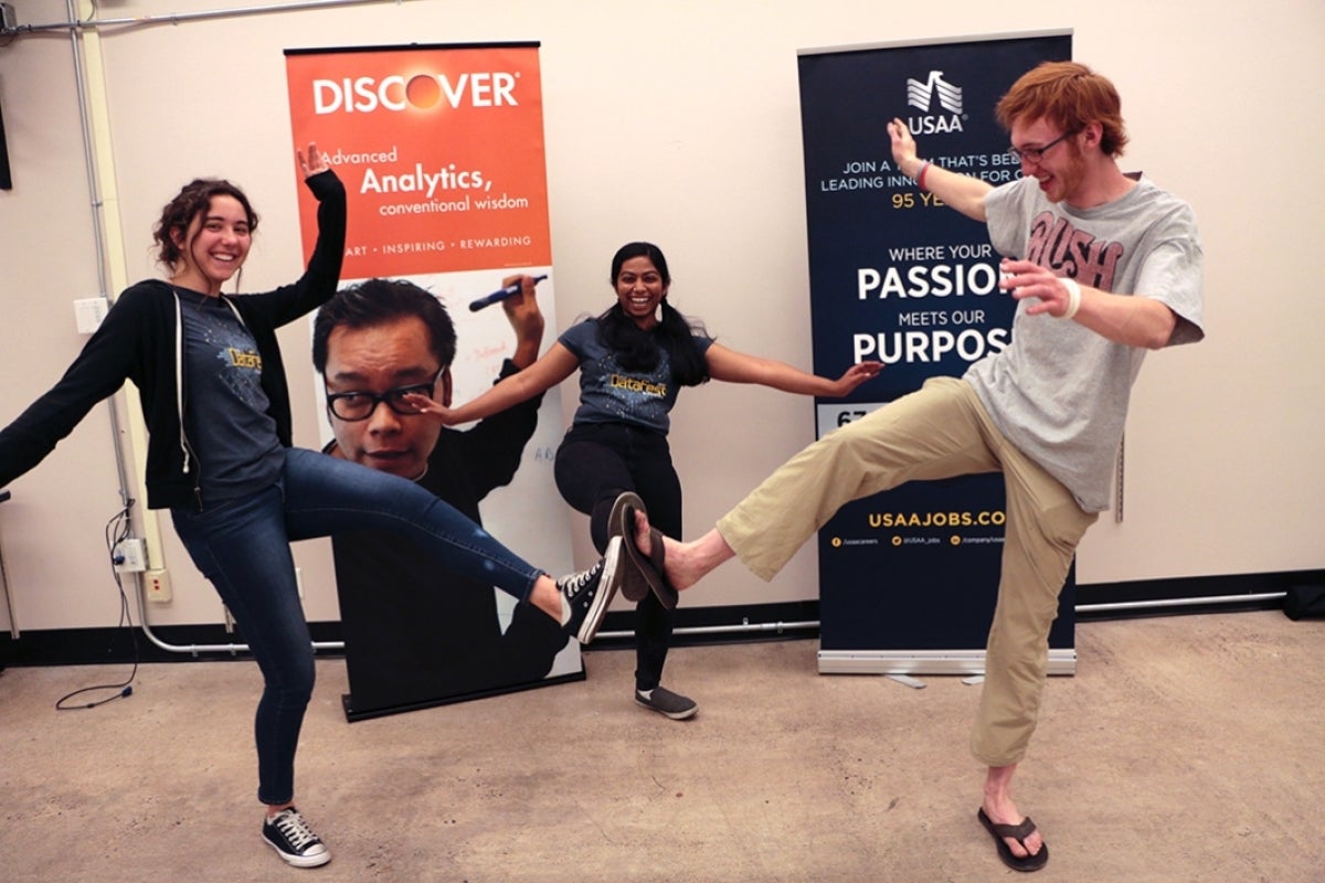 Janani Lakshmanan and her teammates celebrate at the end of DataFest