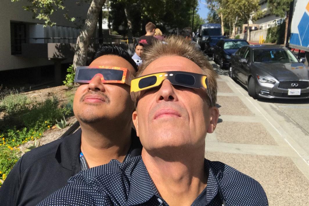 ASU student Nathan Barba watches the solar eclipse with his mentor