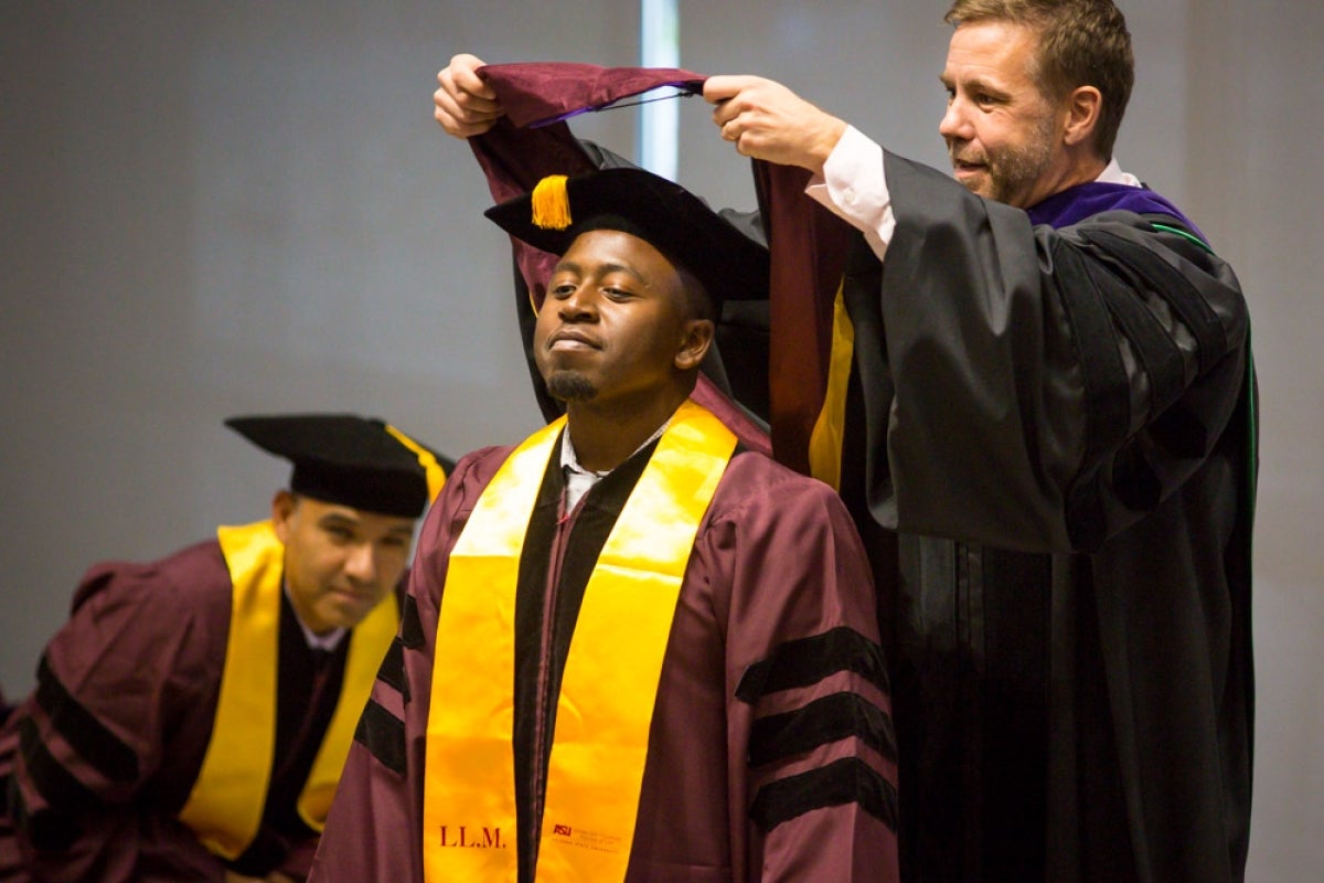 Alpha Muluh gets hooded