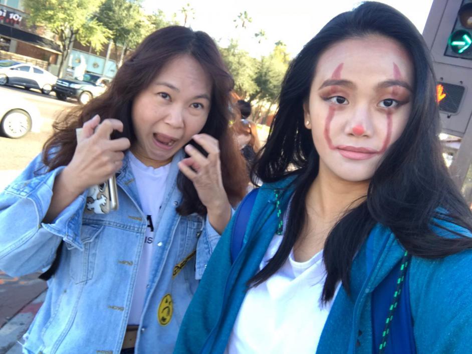 Mother and daughter pose on Halloween