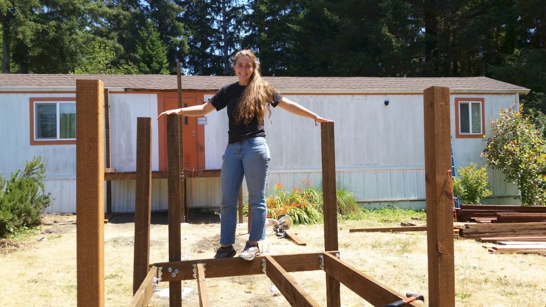 Lopez building a wheelchair ramp