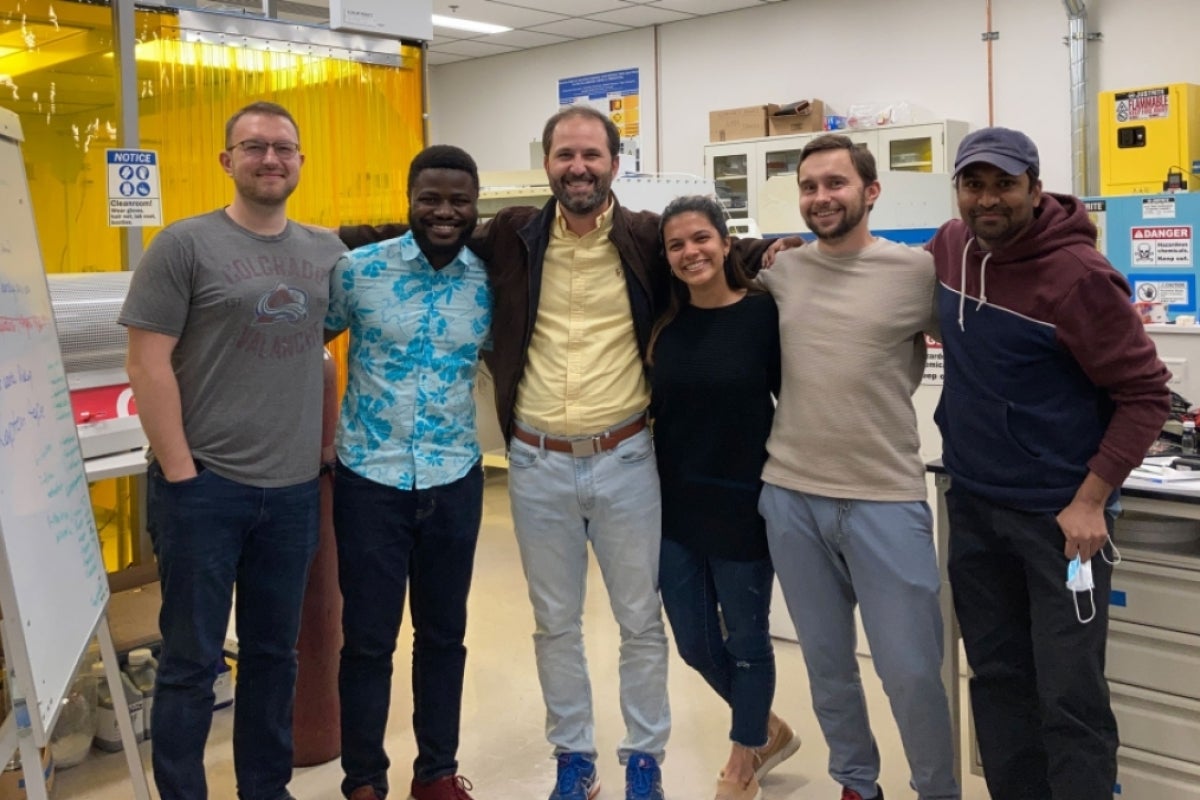 Bruno Azeredo’s research group, Stanislau “Stas” Niauzorau, Emmanuel Dasinor, Bruno Azeredo, Natalya Kublik, Aliaksandr “Sasha” Sharstniou and Amm Hasib, stand for a photo.