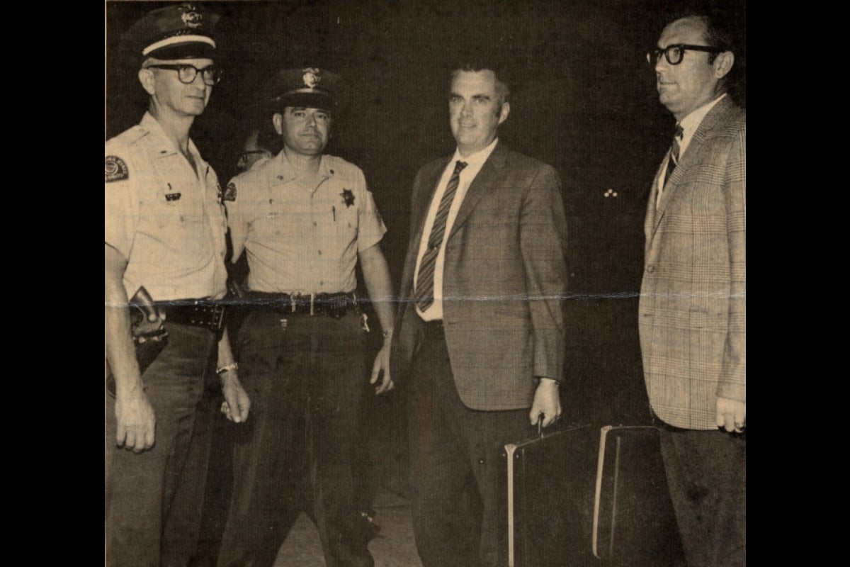 Carleton Moore with Apollo lunar sample and police escort